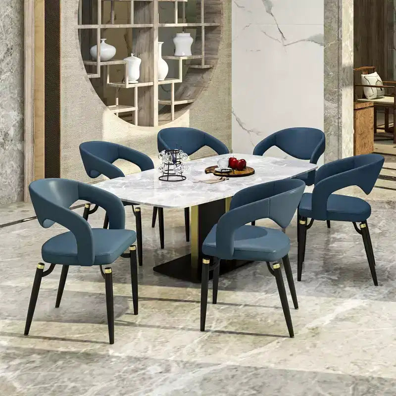Sedia da pranzo imbottita con schienale curvo aperto e gambe in metallo