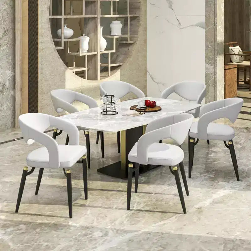 Sedia da pranzo imbottita con schienale curvo aperto e gambe in metallo